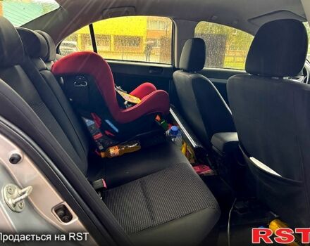 Серый Мицубиси Лансер, объемом двигателя 1.5 л и пробегом 260 тыс. км за 6100 $, фото 7 на Automoto.ua