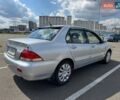 Сірий Міцубісі Lancer, об'ємом двигуна 1.59 л та пробігом 288 тис. км за 4500 $, фото 6 на Automoto.ua
