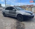 Сірий Міцубісі Lancer, об'ємом двигуна 1.58 л та пробігом 305 тис. км за 3300 $, фото 5 на Automoto.ua