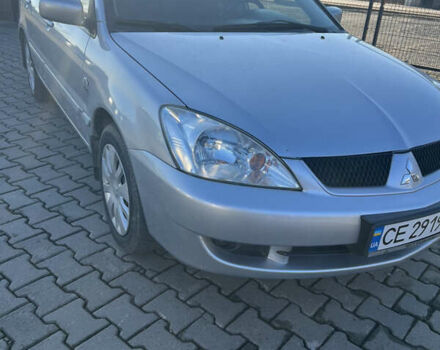 Серый Мицубиси Лансер, объемом двигателя 1.58 л и пробегом 178 тыс. км за 3300 $, фото 2 на Automoto.ua