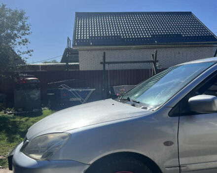 Серый Мицубиси Лансер, объемом двигателя 1.6 л и пробегом 248 тыс. км за 3000 $, фото 5 на Automoto.ua