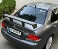 Серый Мицубиси Лансер, объемом двигателя 1.6 л и пробегом 250 тыс. км за 3999 $, фото 5 на Automoto.ua