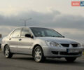Сірий Міцубісі Lancer, об'ємом двигуна 1.3 л та пробігом 160 тис. км за 4999 $, фото 30 на Automoto.ua