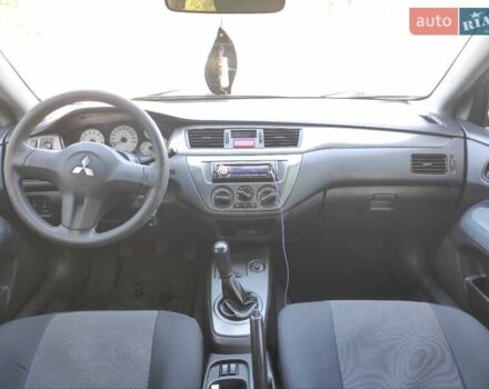 Серый Мицубиси Лансер, объемом двигателя 1.6 л и пробегом 187 тыс. км за 4500 $, фото 4 на Automoto.ua