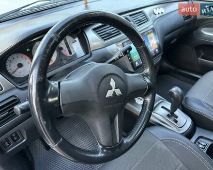 Сірий Міцубісі Lancer, об'ємом двигуна 1.6 л та пробігом 189 тис. км за 6200 $, фото 16 на Automoto.ua