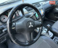 Сірий Міцубісі Lancer, об'ємом двигуна 1.6 л та пробігом 189 тис. км за 6200 $, фото 16 на Automoto.ua