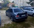 Сірий Міцубісі Lancer, об'ємом двигуна 1.6 л та пробігом 135 тис. км за 5600 $, фото 1 на Automoto.ua