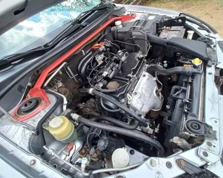 Сірий Міцубісі Lancer, об'ємом двигуна 1.58 л та пробігом 416 тис. км за 3100 $, фото 5 на Automoto.ua