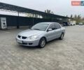 Серый Мицубиси Лансер, объемом двигателя 1.58 л и пробегом 299 тыс. км за 4399 $, фото 1 на Automoto.ua