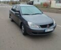 Серый Мицубиси Лансер, объемом двигателя 1.6 л и пробегом 250 тыс. км за 3800 $, фото 2 на Automoto.ua