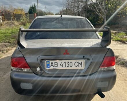 Серый Мицубиси Лансер, объемом двигателя 1.6 л и пробегом 200 тыс. км за 2300 $, фото 2 на Automoto.ua