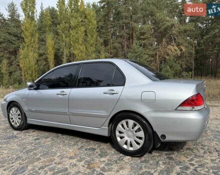 Серый Мицубиси Лансер, объемом двигателя 1.6 л и пробегом 200 тыс. км за 4400 $, фото 11 на Automoto.ua