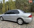 Серый Мицубиси Лансер, объемом двигателя 1.6 л и пробегом 200 тыс. км за 4400 $, фото 11 на Automoto.ua