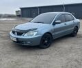 Сірий Міцубісі Lancer, об'ємом двигуна 1.58 л та пробігом 341 тис. км за 4500 $, фото 1 на Automoto.ua