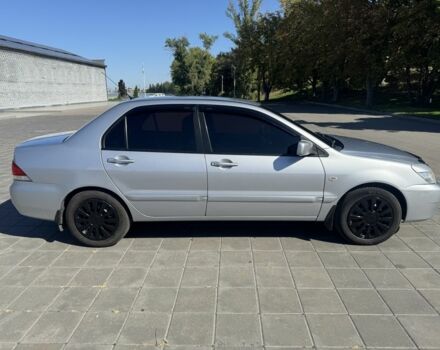 Серый Мицубиси Лансер, объемом двигателя 1.6 л и пробегом 265 тыс. км за 4100 $, фото 2 на Automoto.ua