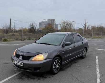 Серый Мицубиси Лансер, объемом двигателя 1.6 л и пробегом 350 тыс. км за 2850 $, фото 13 на Automoto.ua