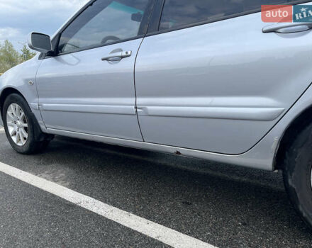 Серый Мицубиси Лансер, объемом двигателя 1.58 л и пробегом 232 тыс. км за 4900 $, фото 11 на Automoto.ua