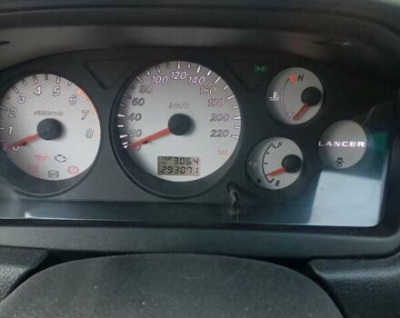 Сірий Міцубісі Lancer, об'ємом двигуна 1.6 л та пробігом 293 тис. км за 5000 $, фото 14 на Automoto.ua