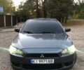 Серый Мицубиси Лансер, объемом двигателя 1.5 л и пробегом 174 тыс. км за 5600 $, фото 1 на Automoto.ua