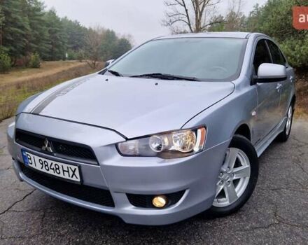 Серый Мицубиси Лансер, объемом двигателя 2 л и пробегом 213 тыс. км за 6550 $, фото 1 на Automoto.ua