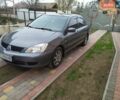 Сірий Міцубісі Lancer, об'ємом двигуна 1.58 л та пробігом 202 тис. км за 3300 $, фото 1 на Automoto.ua