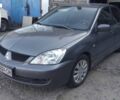 Сірий Міцубісі Lancer, об'ємом двигуна 1.6 л та пробігом 390 тис. км за 1940 $, фото 1 на Automoto.ua