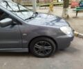 Сірий Міцубісі Lancer, об'ємом двигуна 1.58 л та пробігом 250 тис. км за 4750 $, фото 4 на Automoto.ua