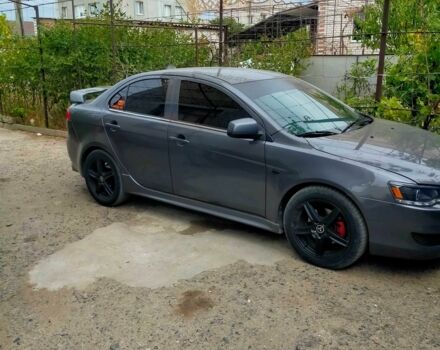 Серый Мицубиси Лансер, объемом двигателя 2 л и пробегом 351 тыс. км за 7000 $, фото 10 на Automoto.ua