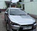 Серый Мицубиси Лансер, объемом двигателя 2 л и пробегом 222 тыс. км за 4900 $, фото 1 на Automoto.ua