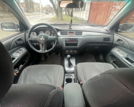 Сірий Міцубісі Lancer, об'ємом двигуна 1.6 л та пробігом 200 тис. км за 4200 $, фото 6 на Automoto.ua