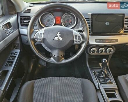 Серый Мицубиси Лансер, объемом двигателя 2 л и пробегом 282 тыс. км за 5450 $, фото 49 на Automoto.ua