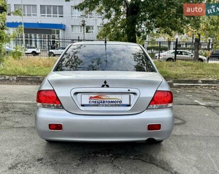 Сірий Міцубісі Lancer, об'ємом двигуна 1.58 л та пробігом 138 тис. км за 4990 $, фото 14 на Automoto.ua