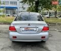 Сірий Міцубісі Lancer, об'ємом двигуна 1.58 л та пробігом 138 тис. км за 4990 $, фото 14 на Automoto.ua
