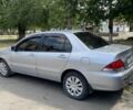 Сірий Міцубісі Lancer, об'ємом двигуна 1.6 л та пробігом 270 тис. км за 3800 $, фото 1 на Automoto.ua
