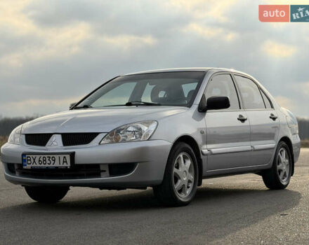 Серый Мицубиси Лансер, объемом двигателя 1.3 л и пробегом 160 тыс. км за 5555 $, фото 4 на Automoto.ua