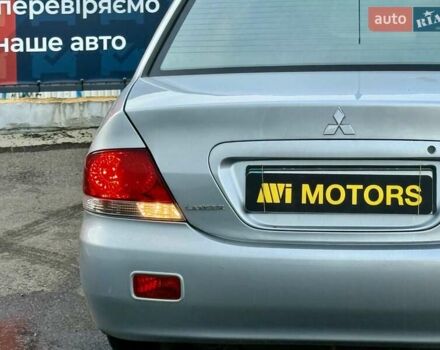 Сірий Міцубісі Lancer, об'ємом двигуна 1.6 л та пробігом 395 тис. км за 4900 $, фото 12 на Automoto.ua