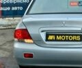 Сірий Міцубісі Lancer, об'ємом двигуна 1.6 л та пробігом 395 тис. км за 4900 $, фото 12 на Automoto.ua