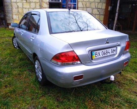 Сірий Міцубісі Lancer, об'ємом двигуна 1 л та пробігом 400 тис. км за 2850 $, фото 4 на Automoto.ua