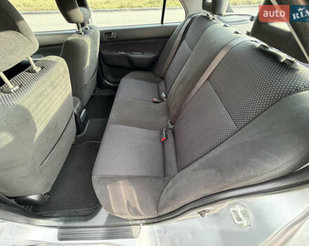 Серый Мицубиси Лансер, объемом двигателя 1.3 л и пробегом 160 тыс. км за 5555 $, фото 54 на Automoto.ua