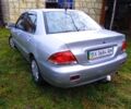 Сірий Міцубісі Lancer, об'ємом двигуна 1 л та пробігом 400 тис. км за 2850 $, фото 4 на Automoto.ua