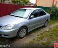 Сірий Міцубісі Lancer, об'ємом двигуна 1.6 л та пробігом 193 тис. км за 4300 $, фото 1 на Automoto.ua