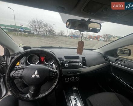 Серый Мицубиси Лансер, объемом двигателя 2 л и пробегом 286 тыс. км за 5800 $, фото 11 на Automoto.ua