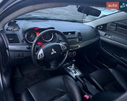 Серый Мицубиси Лансер, объемом двигателя 2 л и пробегом 170 тыс. км за 6999 $, фото 10 на Automoto.ua