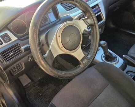 Серый Мицубиси Лансер, объемом двигателя 2 л и пробегом 353 тыс. км за 4800 $, фото 18 на Automoto.ua