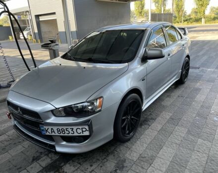 Серый Мицубиси Лансер, объемом двигателя 2 л и пробегом 244 тыс. км за 6500 $, фото 1 на Automoto.ua