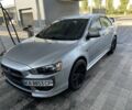 Серый Мицубиси Лансер, объемом двигателя 2 л и пробегом 244 тыс. км за 6500 $, фото 1 на Automoto.ua
