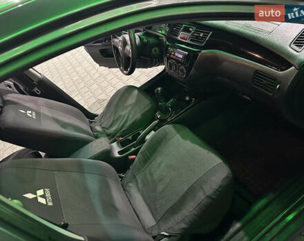 Серый Мицубиси Лансер, объемом двигателя 1.6 л и пробегом 112 тыс. км за 2800 $, фото 18 на Automoto.ua