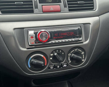 Серый Мицубиси Лансер, объемом двигателя 1.6 л и пробегом 254 тыс. км за 4500 $, фото 44 на Automoto.ua