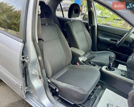 Сірий Міцубісі Lancer, об'ємом двигуна 1.58 л та пробігом 138 тис. км за 4990 $, фото 18 на Automoto.ua