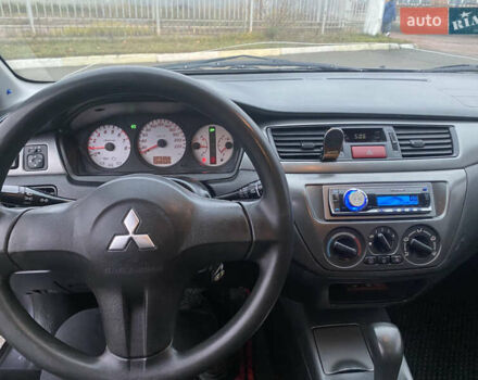 Серый Мицубиси Лансер, объемом двигателя 1.6 л и пробегом 346 тыс. км за 4299 $, фото 10 на Automoto.ua